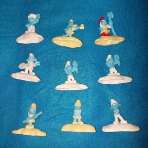 **3 Listings $30**                            9 Smurf figurines